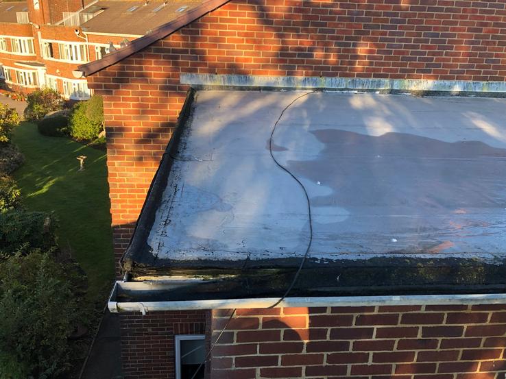 Before - old and damaged flat roof in Bournemouth 